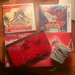 Nintendo 3ds XL  Pokémon edition, includes 2 games